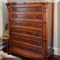 F62. Seven-drawer Victorian walnut chest with marble top and burlwood inlay. 